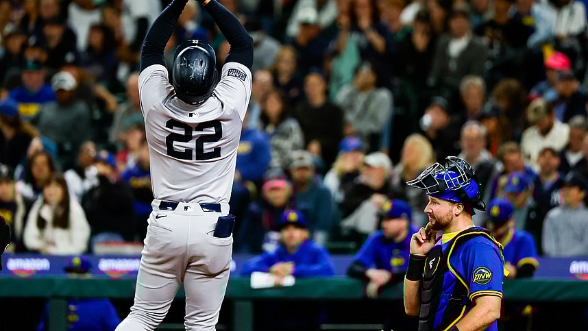 Sep 17, 2024; Seattle, Washington, USA; New York Yankees right fielder Juan Soto (22) celebrates a two-run home run against the Seattle Mariners during the fourth inning at T-Mobile Park. Seattle Mariners catcher Cal Raleigh (29) reacts at right. Mandatory Credit: Joe Nicholson-Imagn Images