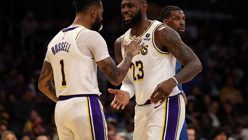 Mar 10, 2024; Los Angeles, California, USA;  Los Angeles Lakers forward LeBron James (23) greets guard D'Angelo Russell (1) after Russell scored a basket during the second quarter against the Minnesota Timberwolves at Crypto.com Arena. Mandatory Credit: Kiyoshi Mio-Imagn Images