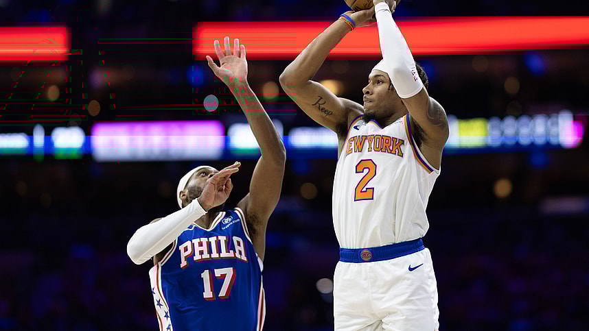 May 2, 2024; Philadelphia, Pennsylvania, USA; New York Knicks guard Miles McBride (2) shoots against Philadelphia 76ers guard Buddy Hield (17) during the first half of game six of the first round for the 2024 NBA playoffs at Wells Fargo Center. Mandatory Credit: Bill Streicher-Imagn Images