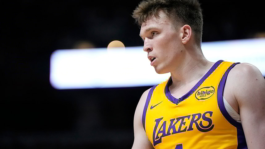 Jul 12, 2024; Las Vegas, NV, USA;  Los Angeles Lakers forward Dalton Knecht (4) competes during the first half against the Houston Rockets at the Thomas & Mack Center. Mandatory Credit: Lucas Peltier-Imagn Images
