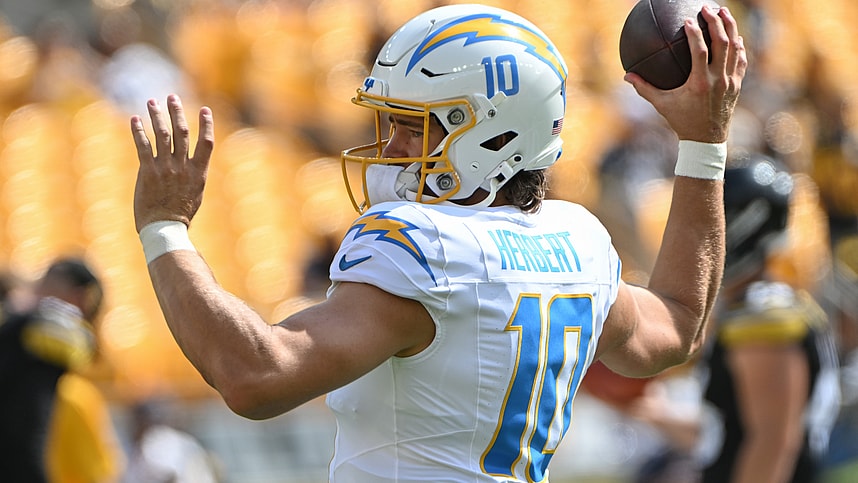 Sep 22, 2024; Pittsburgh, Pennsylvania, USA; Los Angeles Chargers quarterback Justin Herbert (10) works out before a game against the Pittsburgh Steelers at Acrisure Stadium. Mandatory Credit: Barry Reeger-Imagn Images