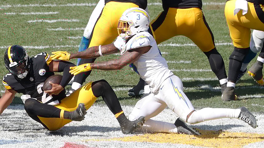 Sep 22, 2024; Pittsburgh, Pennsylvania, USA;  Los Angeles Chargers safety Derwin James Jr. (3) sacks Pittsburgh Steelers quarterback Justin Fields (2) during the third quarter at Acrisure Stadium. Pittsburgh won 20-10. Mandatory Credit: Charles LeClaire-Imagn Images