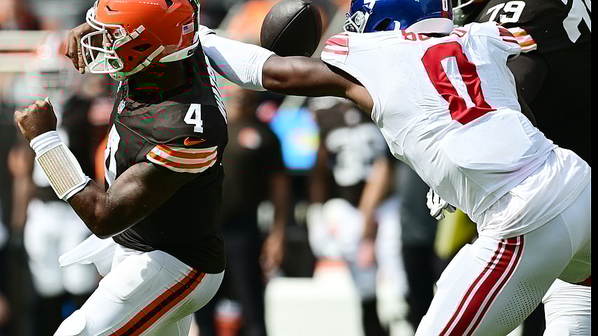 Sep 22, 2024; Cleveland, Ohio, USA; New York Giants linebacker Brian Burns (0) strip sacks Cleveland Browns quarterback Deshaun Watson (4) during the first half at Huntington Bank Field. Mandatory Credit: Ken Blaze-Imagn Images