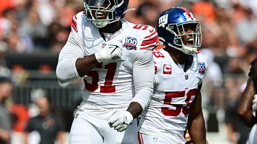 Sep 22, 2024; Cleveland, Ohio, USA; New York Giants linebacker Bobby Okereke (58) and New York Giants linebacker Azeez Ojulari (51) celebrate after a sack during the first quarter against the Cleveland Browns at Huntington Bank Field. Mandatory Credit: Ken Blaze-Imagn Images