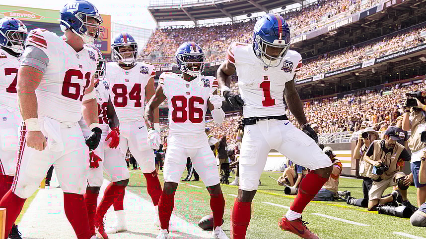 Sep 22, 2024; Cleveland, Ohio, USA; New York Giants wide receiver Malik Nabers (1) celebrates his touchdown with teammates against the Cleveland Browns during the second quarter at Huntington Bank Field. Mandatory Credit: Scott Galvin-Imagn Images