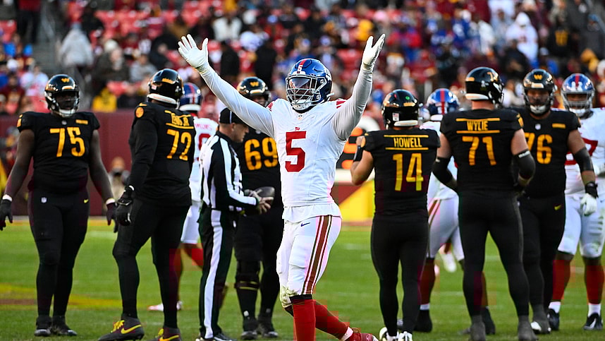 Nov 19, 2023; Landover, Maryland, USA; New York Giants linebacker Kayvon Thibodeaux (5) celebrate after a sack against the Washington Commandersduring the second half at FedExField. Mandatory Credit: Brad Mills-Imagn Images