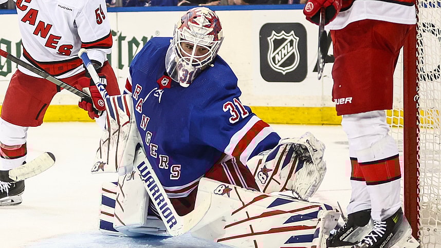 May 5, 2024; New York, New York, USA; New York Rangers goaltender Igor Shesterkin (31) makes a save in the third period against the Carolina Hurricanes in game one of the second round of the 2024 Stanley Cup Playoffs at Madison Square Garden. Mandatory Credit: Wendell Cruz-Imagn Images