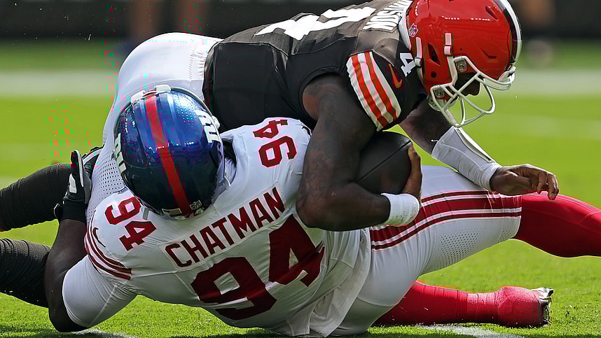 Cleveland Browns quarterback Deshaun Watson (4) is sacked by /New York Giants defensive tackle Elijah Chatman (94) during the first half of an NFL football game at Huntington Bank Field, Sunday, Sept. 22, 2024, in Cleveland, Ohio.