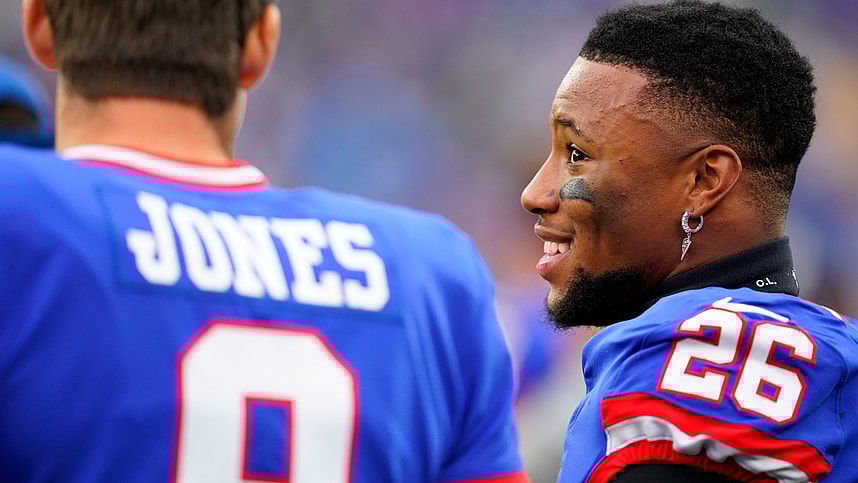New York Giants running back Saquon Barkley (26) and quarterback Daniel Jones (8) talk on the sideline as the fourth quarter ends during the Giants win over the Chicago Bears at MetLife Stadium on Sunday, Oct. 2, 2022, in East Rutherford.