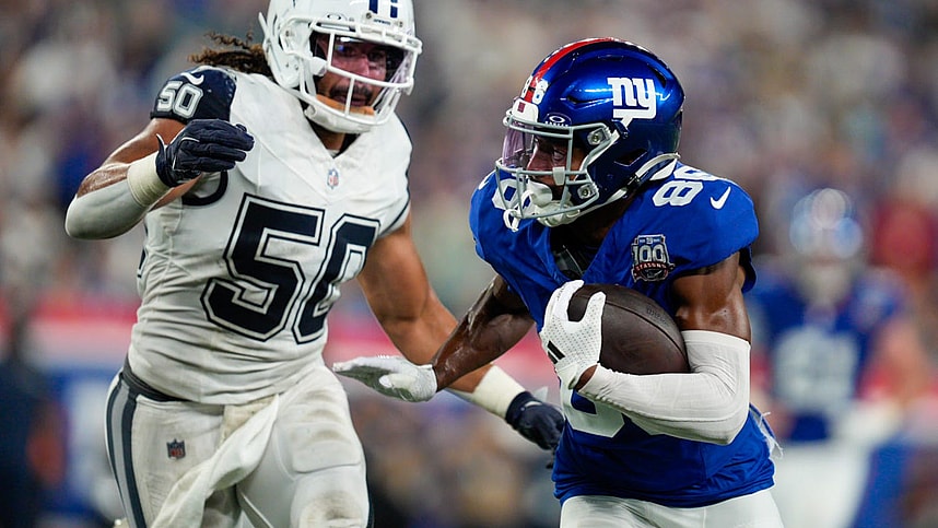 Sep 26, 2024; East Rutherford, NJ, US; New York Giants wide receiver Darius Slayton (86) runs with the ball after a catch while being chased by Dallas Cowboys linebacker Eric Kendricks (50) at MetLife Stadium. Mandatory Credit: Julian Guadalupe-NorthJersey.com