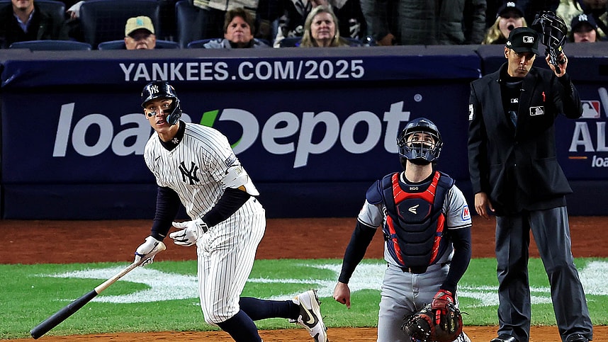 Oct 15, 2024; Bronx, New York, USA; New York Yankees outfielder Aaron Judge (99) hits a two run home run during the seventh inning against the Cleveland Guardians in game two of the ALCS for the 2024 MLB Playoffs at Yankee Stadium. Mandatory Credit: Brad Penner-Imagn Images