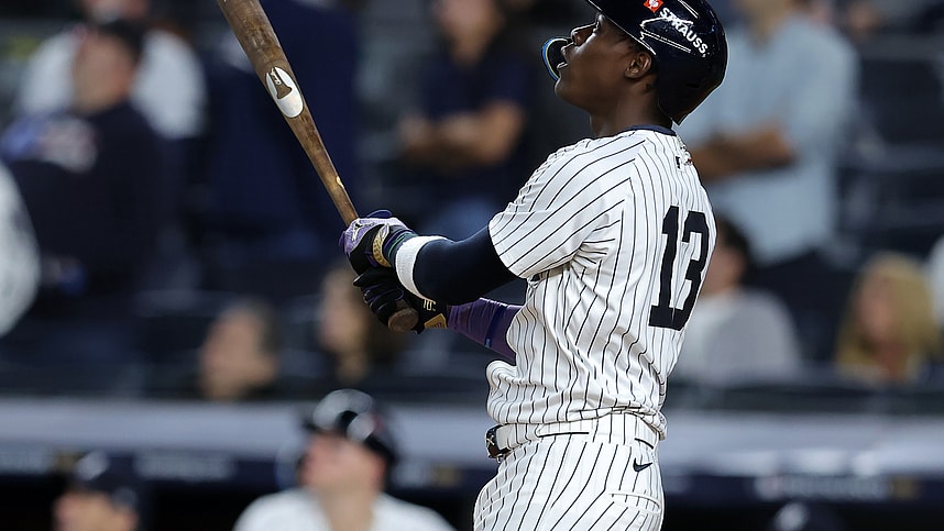 Oct 7, 2024; Bronx, New York, USA; New York Yankees third base Jazz Chisholm Jr. (13) hits a solo home run against the Kansas City Royals in the ninth inning during game two of the ALDS for the 2024 MLB Playoffs at Yankee Stadium. Mandatory Credit: Brad Penner-Imagn Images