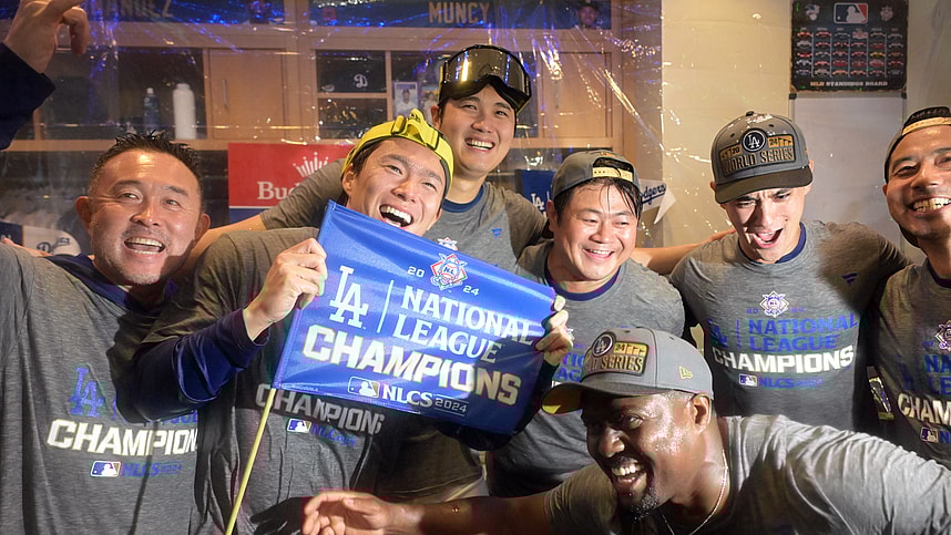 Oct 20, 2024; Los Angeles, California, USA; Los Angeles Dodgers pitcher Yoshinobu Yamamoto (18) and designated hitter Shohei Ohtani (17) celebrate in the clubhouse after defeating the New York Mets in game six of the NLCS for the 2024 MLB playoffs at Dodger Stadium. Mandatory Credit: Jayne Kamin-Oncea-Imagn Images