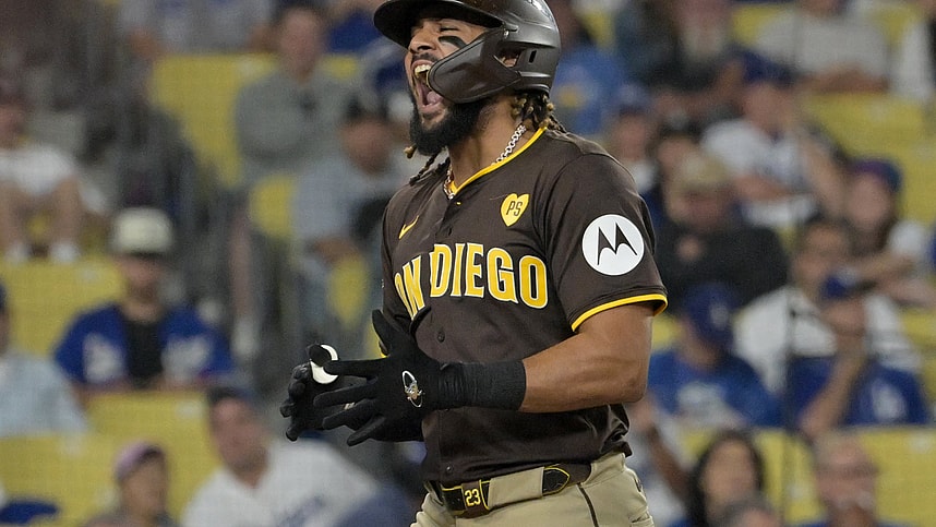 Oct 6, 2024; Los Angeles, California, USA; San Diego Padres outfielder Fernando Tatis Jr. (23) celebrates after hitting a two run home run in the ninth inning against the Los Angeles Dodgers during game two of the NLDS for the 2024 MLB Playoffs at Dodger Stadium. Mandatory Credit: Jayne Kamin-Oncea-Imagn Images