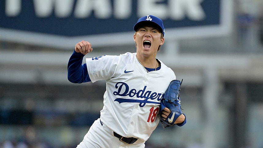 Oct 11, 2024; Los Angeles, California, USA; Los Angeles Dodgers pitcher Yoshinobu Yamamoto (18) reacts in the second inning against the San Diego Padres during game five of the NLDS for the 2024 MLB Playoffs at Dodger Stadium. Mandatory Credit: Jayne Kamin-Oncea-Imagn Images