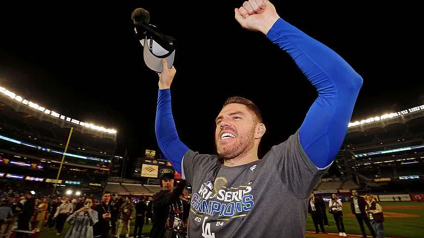 Oct 31, 2024; New York, New York, USA; Los Angeles Dodgers first baseman Freddie Freeman (5) celebrates after the Los Angeles Dodgers beat the New York Yankees in game four to win the 2024 MLB World Series at Yankee Stadium. Mandatory Credit: Brad Penner-Imagn Images