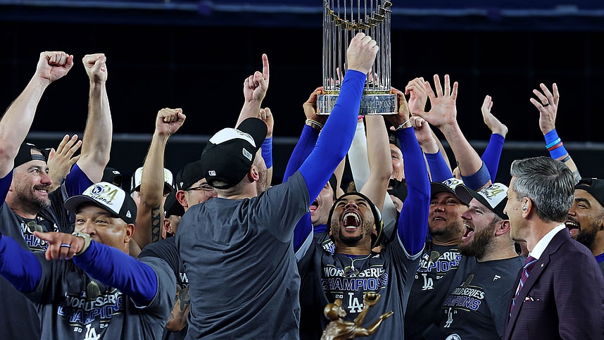 Oct 31, 2024; New York, New York, USA; Los Angeles Dodgers first baseman Freddie Freeman (5) celebrates with the Commissioner’s Trophy after the Los Angeles Dodgers beat the New York Yankees in game four to win the 2024 MLB World Series at Yankee Stadium. Mandatory Credit: Brad Penner-Imagn Images