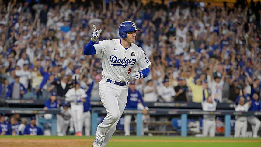 Oct 26, 2024; Los Angeles, California, USA; Los Angeles Dodgers first baseman Freddie Freeman (5) reacts after hitting a solo home run in the third inning against the New York Yankees during game two of the 2024 MLB World Series at Dodger Stadium. Mandatory Credit: Jayne Kamin-Oncea-Imagn Images