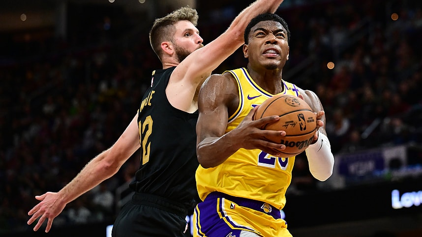 Oct 30, 2024; Cleveland, Ohio, USA; Los Angeles Lakers forward Rui Hachimura (28) drives to the basket against Cleveland Cavaliers forward Dean Wade (32) during the second half at Rocket Mortgage FieldHouse. Mandatory Credit: Ken Blaze-Imagn Images