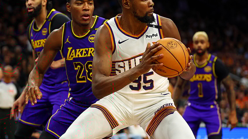 Oct 28, 2024; Phoenix, Arizona, USA; Phoenix Suns forward Kevin Durant (35) handles the ball against Los Angeles Lakers forward Rui Hachimura (28) during the second half at Footprint Center. Mandatory Credit: Mark J. Rebilas-Imagn Images