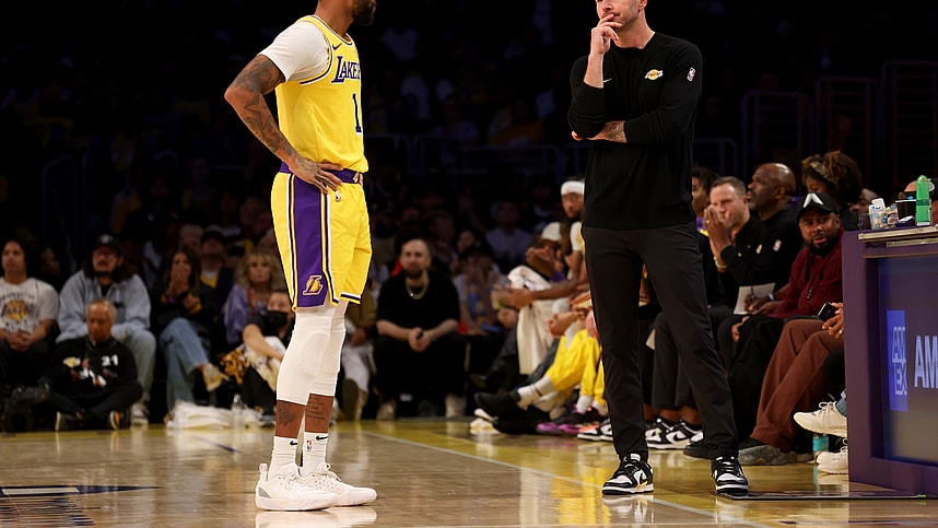 Oct 22, 2024; Los Angeles, California, USA; Los Angeles Lakers guard D'Angelo Russell (1) talks with head coach JJ Redick during the first quarter against the Minnesota Timberwolves at Crypto.com Arena. Mandatory Credit: Jason Parkhurst-Imagn Images