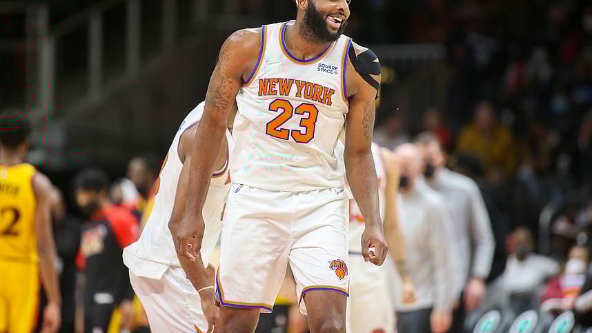 Jan 15, 2022; Atlanta, Georgia, USA; New York Knicks center Mitchell Robinson (23) celebrates after a dunk against the Atlanta Hawks in the second half at State Farm Arena. Mandatory Credit: Brett Davis-Imagn Images