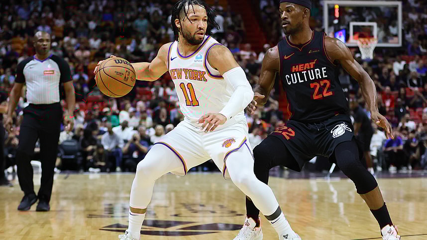 Apr 2, 2024; Miami, Florida, USA; New York Knicks guard Jalen Brunson (11) dribbles the basketball as Miami Heat forward Jimmy Butler (22) defends during the first quarter at Kaseya Center. Mandatory Credit: Sam Navarro-Imagn Images