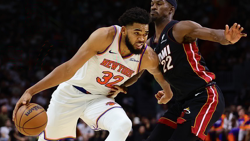 Oct 30, 2024; Miami, Florida, USA; New York Knicks center Karl-Anthony Towns (32) drives to the basketball against Miami Heat forward Jimmy Butler (22) during the fourth quarter at Kaseya Center. Mandatory Credit: Sam Navarro-Imagn Images