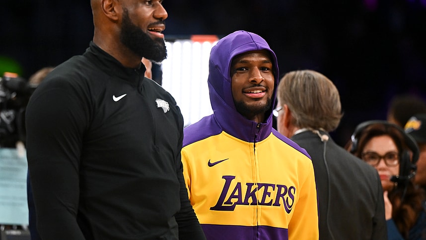 Oct 25, 2024; Los Angeles, California, USA; Los Angeles Lakers guard Bronny James (9) and forward LeBron James (23) warming up before the game against the Phoenix Suns at Crypto.com Arena. Mandatory Credit: Jonathan Hui-Imagn Images