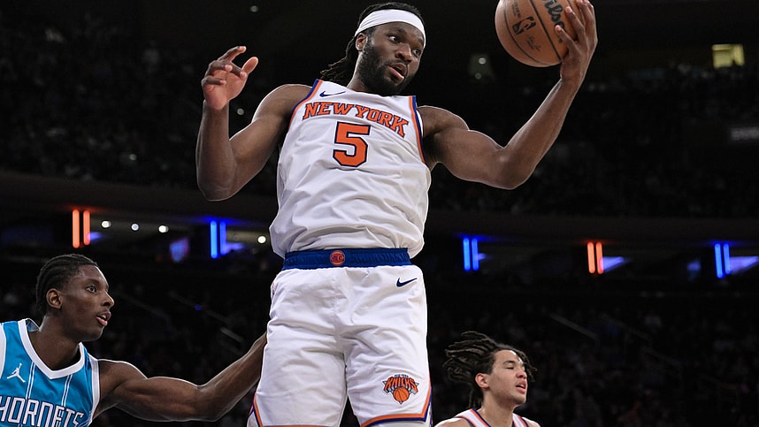 Oct 15, 2024; New York, New York, USA; New York Knicks forward Precious Achiuwa (5) grabs a rebound against the Charlotte Hornets during the second half at Madison Square Garden. Mandatory Credit: John Jones-Imagn Images