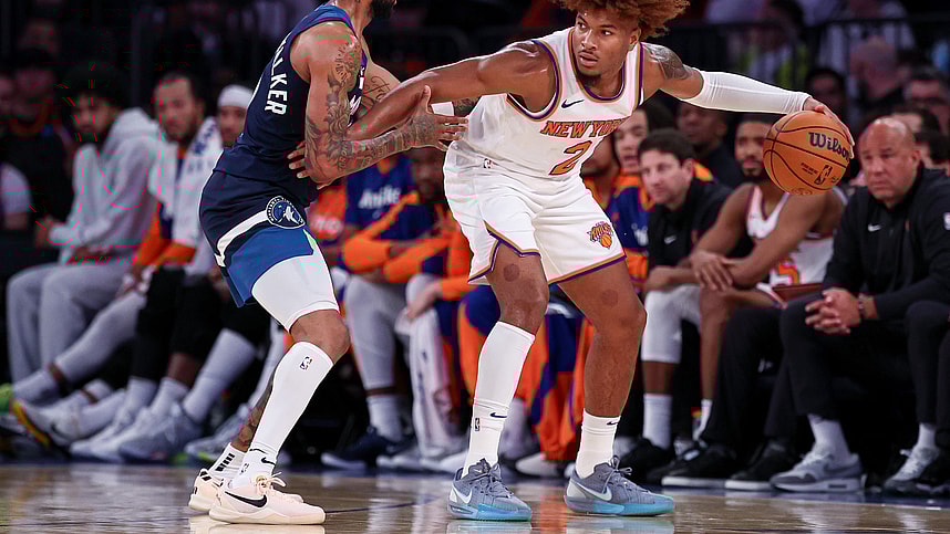 Oct 13, 2024; New York, New York, USA; New York Knicks guard Miles McBride (2) is defended by Minnesota Timberwolves guard Nickeil Alexander-Walker (9) during the second half at Madison Square Garden. Mandatory Credit: Vincent Carchietta-Imagn Images