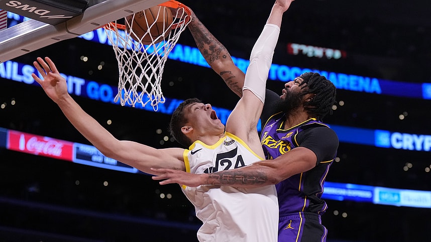 Nov 4, 2022; Los Angeles, California, USA; Los Angeles Lakers forward Anthony Davis (3) dunks the ball against Utah Jazz center Walker Kessler (24) in the first half at Crypto.com Arena. Mandatory Credit: Kirby Lee-Imagn Images