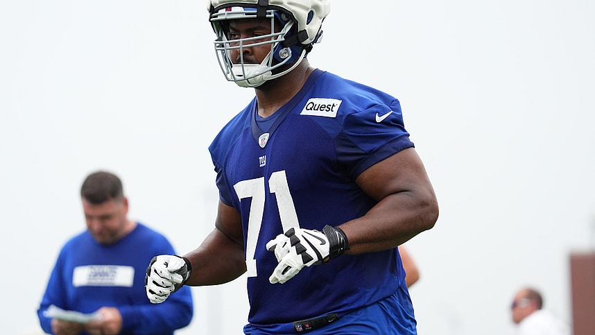 Jul 25, 2024; East Rutherford, NY, USA; New York Giants offensive tackle Marcellus Johnson (71) jogs to the sideline during training camp at Quest Diagnostics Training Center. Mandatory Credit: Lucas Boland-Imagn Images
