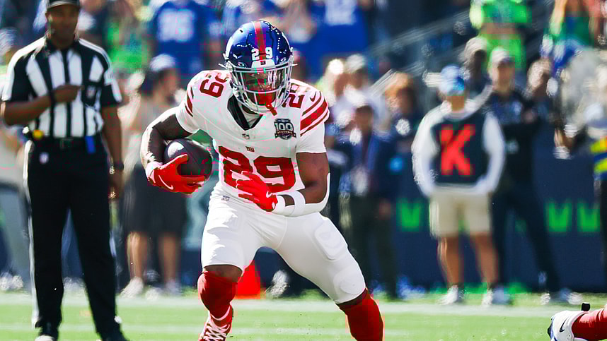 Oct 6, 2024; Seattle, Washington, USA; New York Giants running back Tyrone Tracy Jr. (29) rushes against the Seattle Seahawks during the first quarter at Lumen Field. Mandatory Credit: Joe Nicholson-Imagn Images