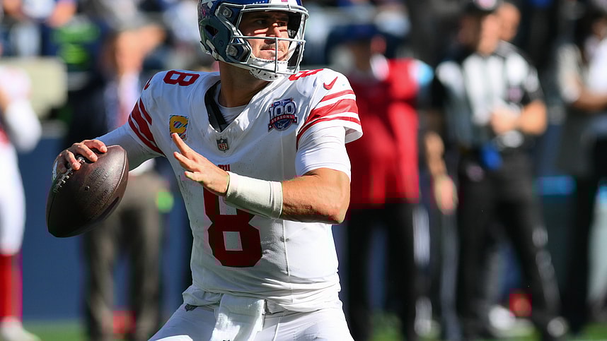 Oct 6, 2024; Seattle, Washington, USA; New York Giants quarterback Daniel Jones (8) passes the ball against the Seattle Seahawks at Lumen Field. Mandatory Credit: Steven Bisig-Imagn Images