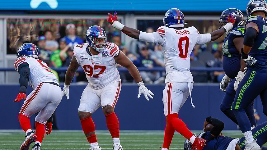 Oct 6, 2024; Seattle, Washington, USA; New York Giants defensive tackle Dexter Lawrence II (97) celebrates following a fourth down sack against the Seattle Seahawks during the fourth quarter at Lumen Field. Mandatory Credit: Joe Nicholson-Imagn Images