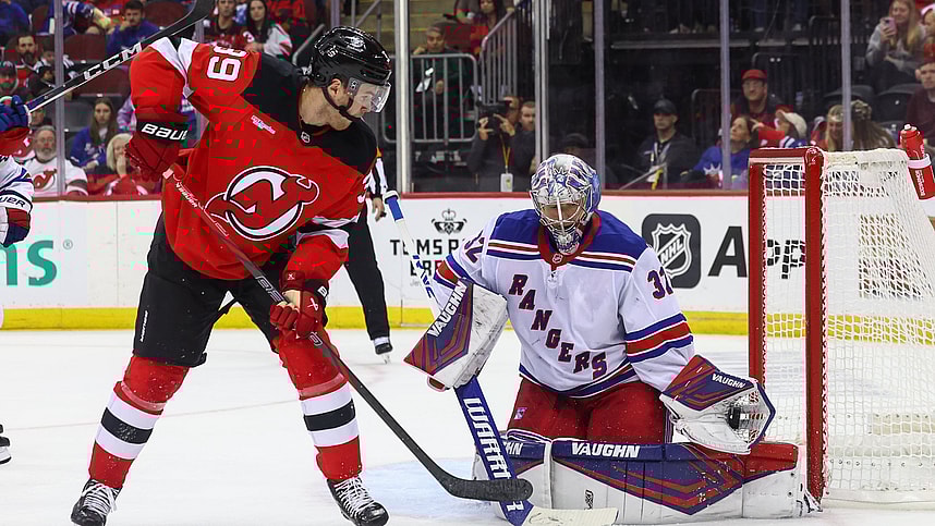 Sep 30, 2024; Newark, New Jersey, USA; New York Rangers goaltender Jonathan Quick (32) makes a save against New Jersey Devils left wing Mike Hardman (39) during the second period at Prudential Center. Mandatory Credit: Ed Mulholland-Imagn Images