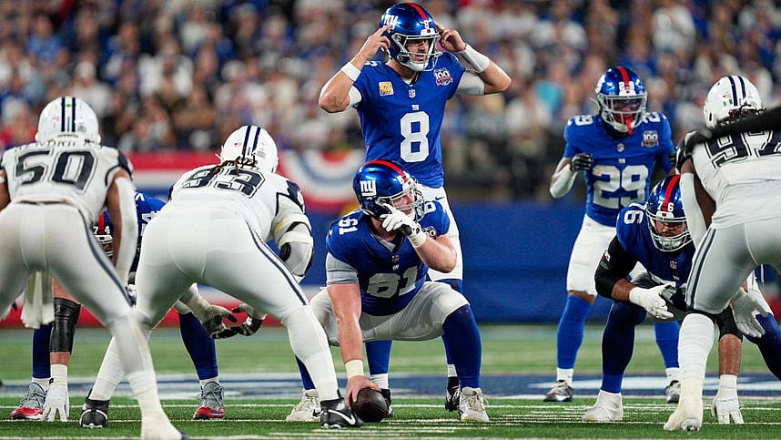 Sep 26, 2024; East Rutherford, NJ, US; New York Giants quarterback Daniel Jones (8) calls a play from behind New York Giants center John Michael Schmitz Jr. (61) at MetLife Stadium. Mandatory Credit: Julian Guadalupe-NorthJersey.com