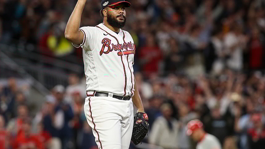Oct 12, 2022; Atlanta, Georgia, USA; Atlanta Braves relief pitcher Kenley Jansen (74) points skyward on a ball hit for the final out against the Philadelphia Phillies in the ninth inning during game two of the NLDS for the 2022 MLB Playoffs at Truist Park. Mandatory Credit: Brett Davis-Imagn Images