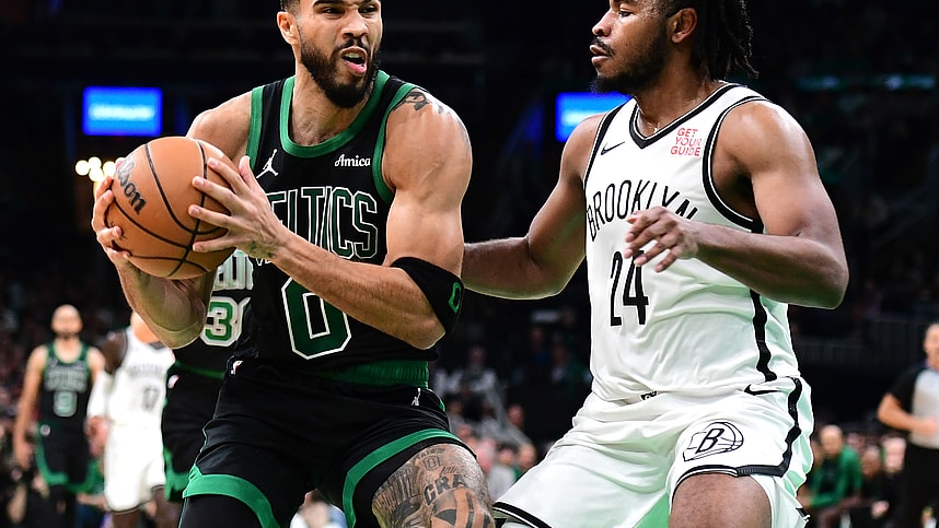 Nov 8, 2024; Boston, Massachusetts, USA;  Boston Celtics forward Jayson Tatum (0) controls the ball while Brooklyn Nets guard Cam Thomas (24) defends during the second half at TD Garden. Mandatory Credit: Bob DeChiara-Imagn Images