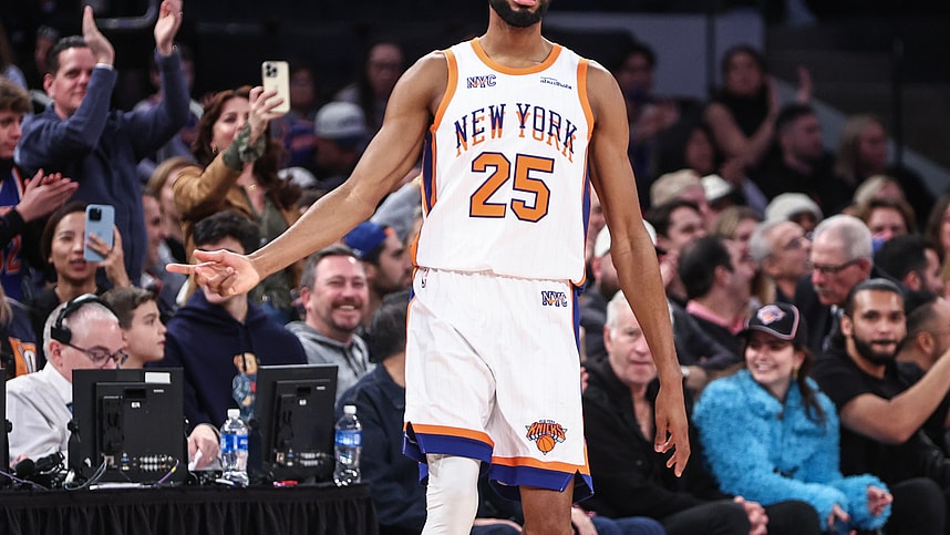 Nov 17, 2024; New York, New York, USA; New York Knicks forward Mikal Bridges (25) gestures after making a three-point shot in the second quarter against the Brooklyn Nets at Madison Square Garden. Mandatory Credit: Wendell Cruz-Imagn Images