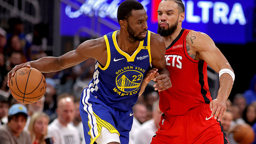 Nov 2, 2024; Houston, Texas, USA; Golden State Warriors forward Andrew Wiggins (22) handles the ball against Houston Rockets forward Dillon Brooks (9) during the third quarter at Toyota Center. Mandatory Credit: Erik Williams-Imagn Images