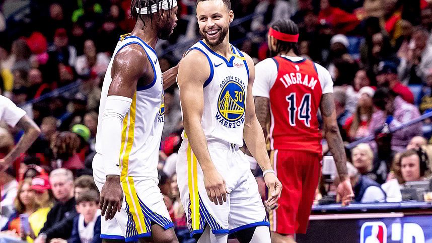 Nov 22, 2024; New Orleans, Louisiana, USA;  Golden State Warriors guard Stephen Curry (30) shares a moment with guard Buddy Hield (7) on a time out against the New Orleans Pelicans during second half at Smoothie King Center. Mandatory Credit: Stephen Lew-Imagn Images