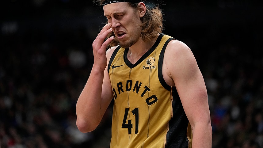 Mar 1, 2024; Toronto, Ontario, CAN; Toronto Raptors forward Kelly Olynyk (41) reacts after being poked in the eye by a Golden State Warriors player during the second half at Scotiabank Arena. Mandatory Credit: John E. Sokolowski-Imagn Images