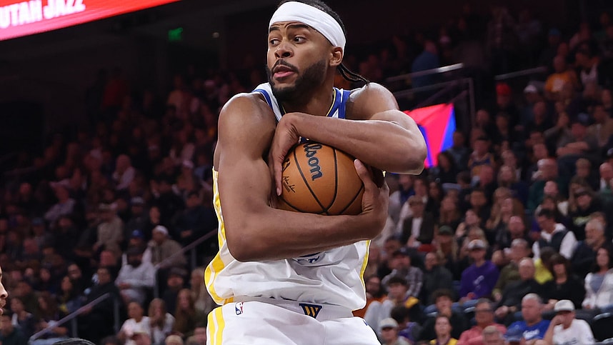 Oct 25, 2024; Salt Lake City, Utah, USA; Golden State Warriors guard Moses Moody (4) wraps up a rebound against the Utah Jazz during the fourth quarter at Delta Center. Mandatory Credit: Rob Gray-Imagn Images