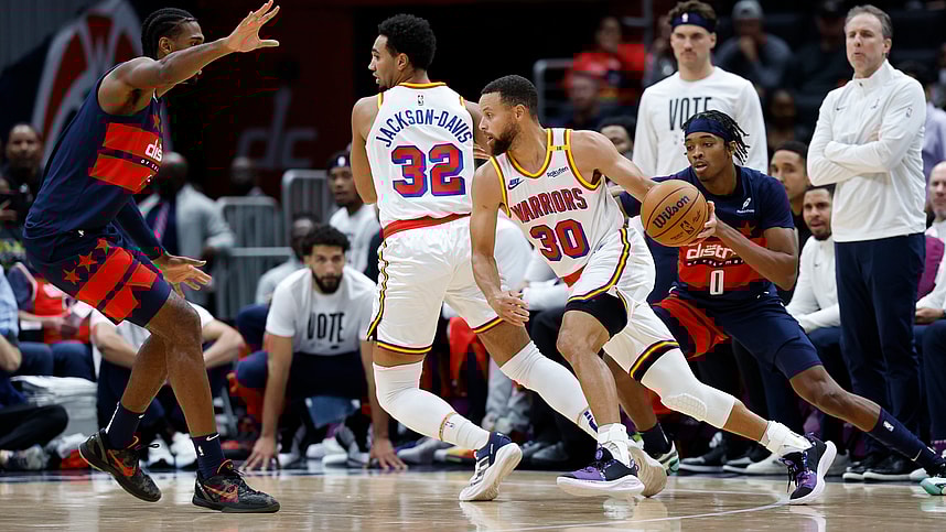 Nov 4, 2024; Washington, District of Columbia, USA; Golden State Warriors guard Stephen Curry (30) dribbles the ball past Washington Wizards guard Bilal Coulibaly (0) in the first half at Capital One Arena. Mandatory Credit: Geoff Burke-Imagn Images