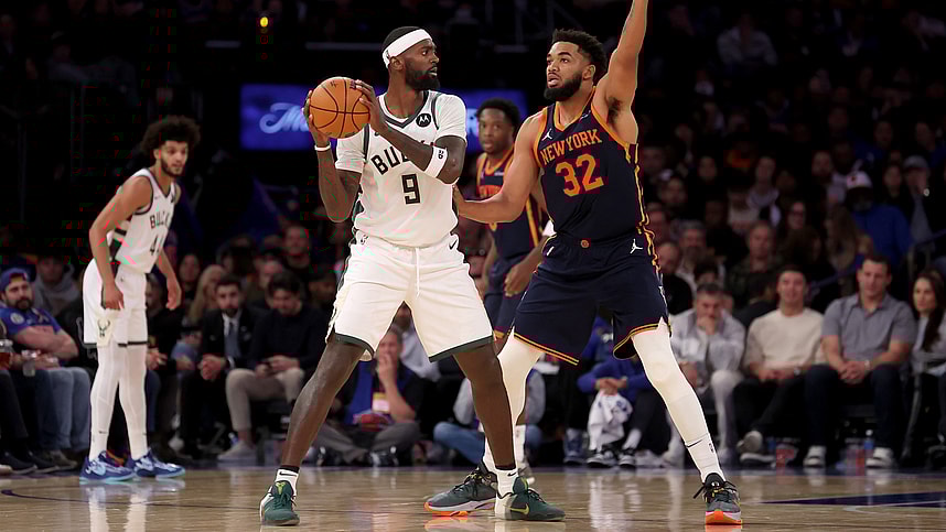 Nov 8, 2024; New York, New York, USA; Milwaukee Bucks forward Bobby Portis (9) looks to pass the ball against New York Knicks center Karl-Anthony Towns (32) during the fourth quarter at Madison Square Garden. Mandatory Credit: Brad Penner-Imagn Images