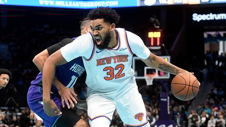 Nov 29, 2024; Charlotte, North Carolina, USA; New York Knicks center Karl-Anthony Towns (32) drives in during the first half against the Charlotte Hornets at the Spectrum Center. Mandatory Credit: Sam Sharpe-Imagn Images