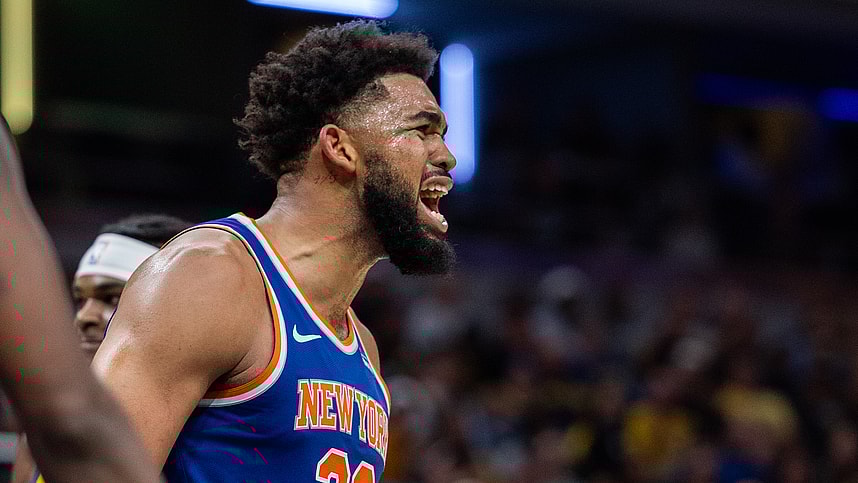 Nov 10, 2024; Indianapolis, Indiana, USA; New York Knicks center Karl-Anthony Towns (32) reacts to an and one basket in the second half against the Indiana Pacers at Gainbridge Fieldhouse. Mandatory Credit: Trevor Ruszkowski-Imagn Images