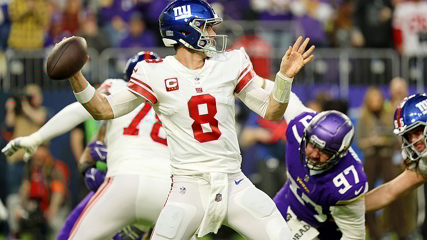 Jan 15, 2023; Minneapolis, Minnesota, USA; New York Giants quarterback Daniel Jones (8) passes the ball against the Minnesota Vikings during the first quarter of a wild card game at U.S. Bank Stadium. Mandatory Credit: Matt Krohn-Imagn Images